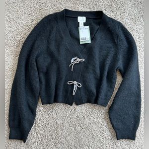 Brand new with tags black cardigan/ Sweater with diamond bow buttons